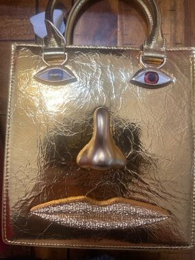 Metallic Gold Novelty Mini Bag with Face Appliqué. Anatomy jewelry bag.
